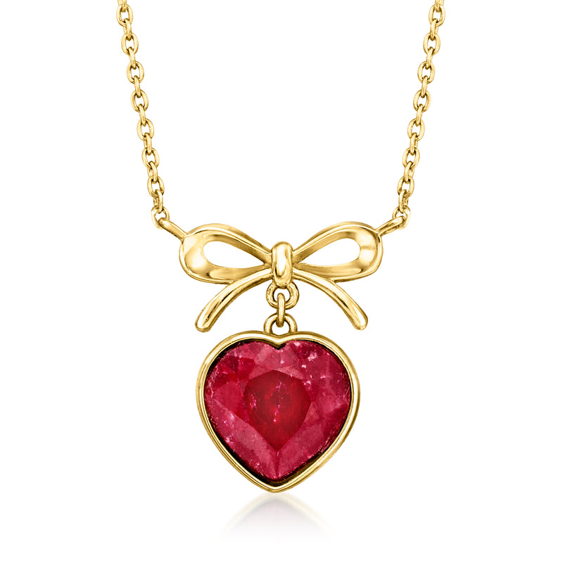 Gold-tone necklace with ruby red heart bezel pendant and bow detail