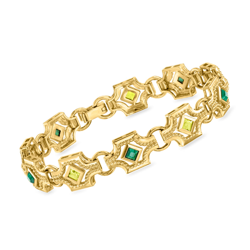 Gold-tone art deco bracelet with geometric links and green square gemstones