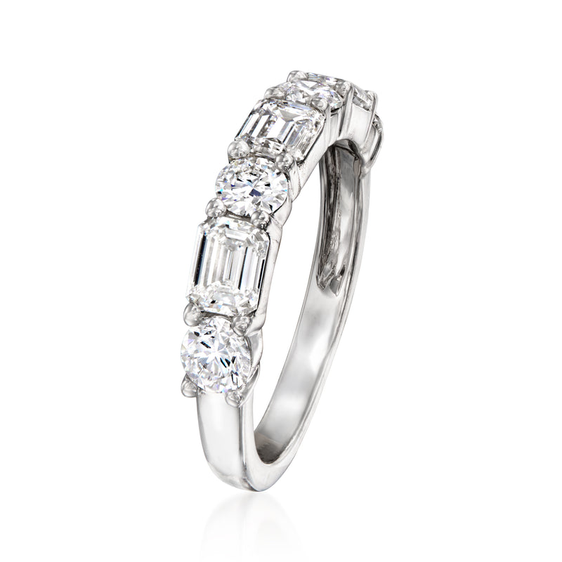 Emerald-cut diamond ring with round stones in a slim 14kt white gold band