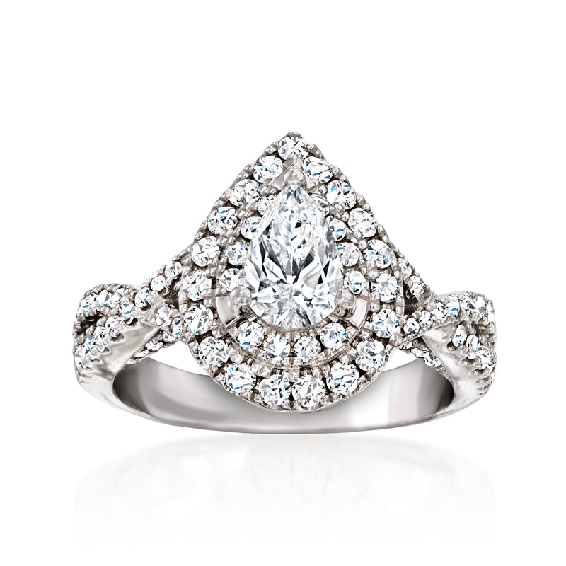 Pear-shaped diamond halo engagement ring in white gold