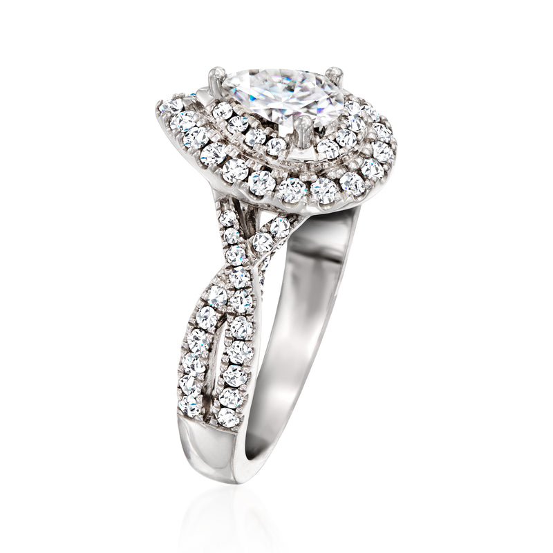 14kt white gold diamond ring with marquise side accents and openwork halo setting