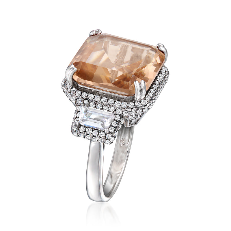 Sterling silver ring with square peach simulated gemstone and bright CZ side accents