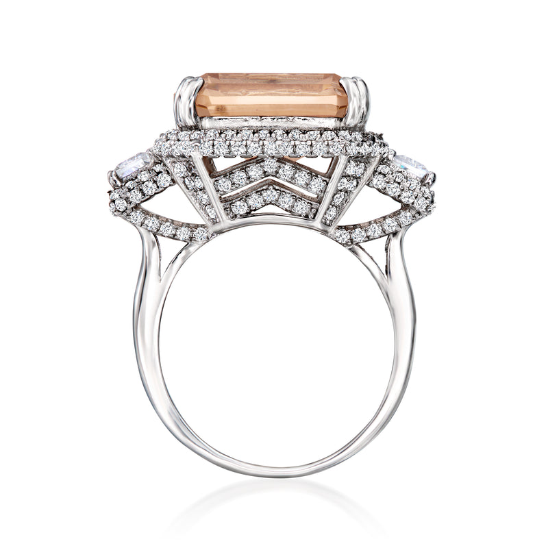 Sterling silver ring with square peach simulated gemstone, arched CZ bridge setting