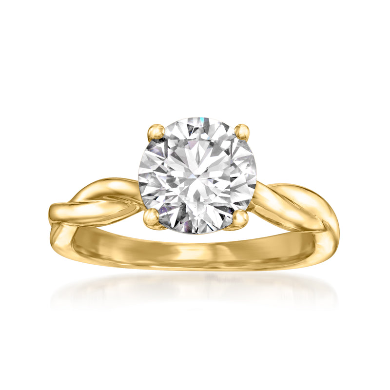 Twisted yellow gold ring with a large round diamond center stone