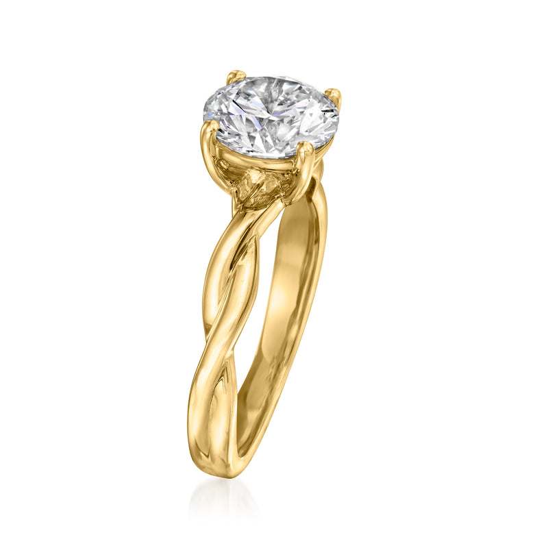 Yellow gold twisted ring with round diamond solitaire in side view