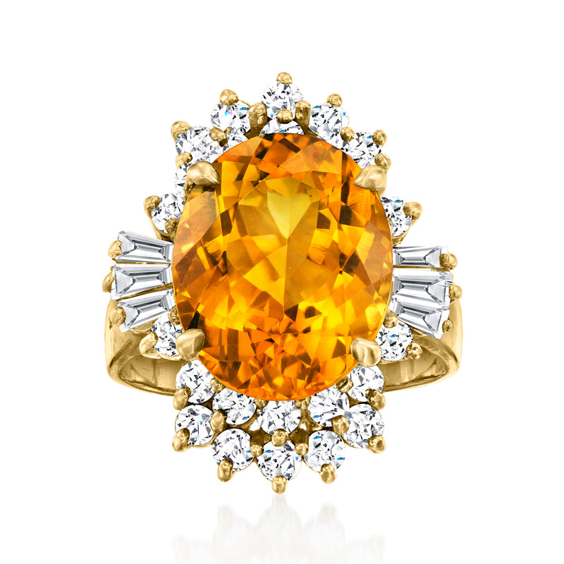 Vintage 14kt yellow gold ring with oval citrine center and diamond halo