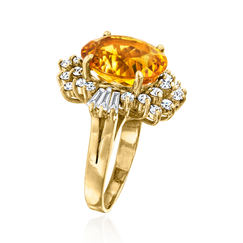 14kt yellow gold ring with oval citrine, diamond side stones, and high prongs