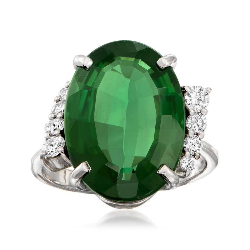 Vintage green tourmaline oval ring in white gold with diamond side clusters