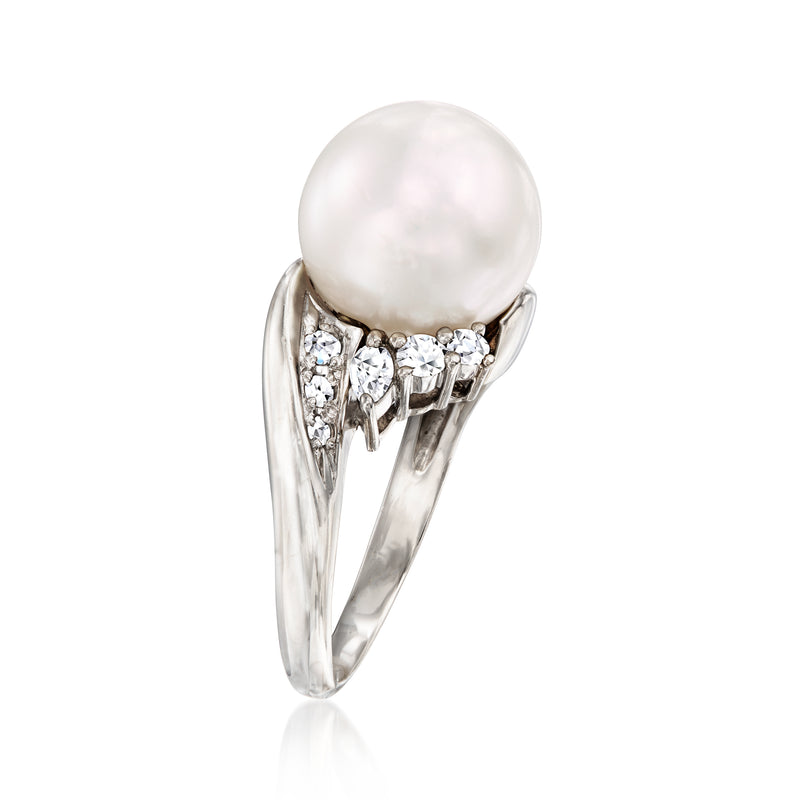 Cultured pearl ring with large white pearl and diamond cluster bands, platinum