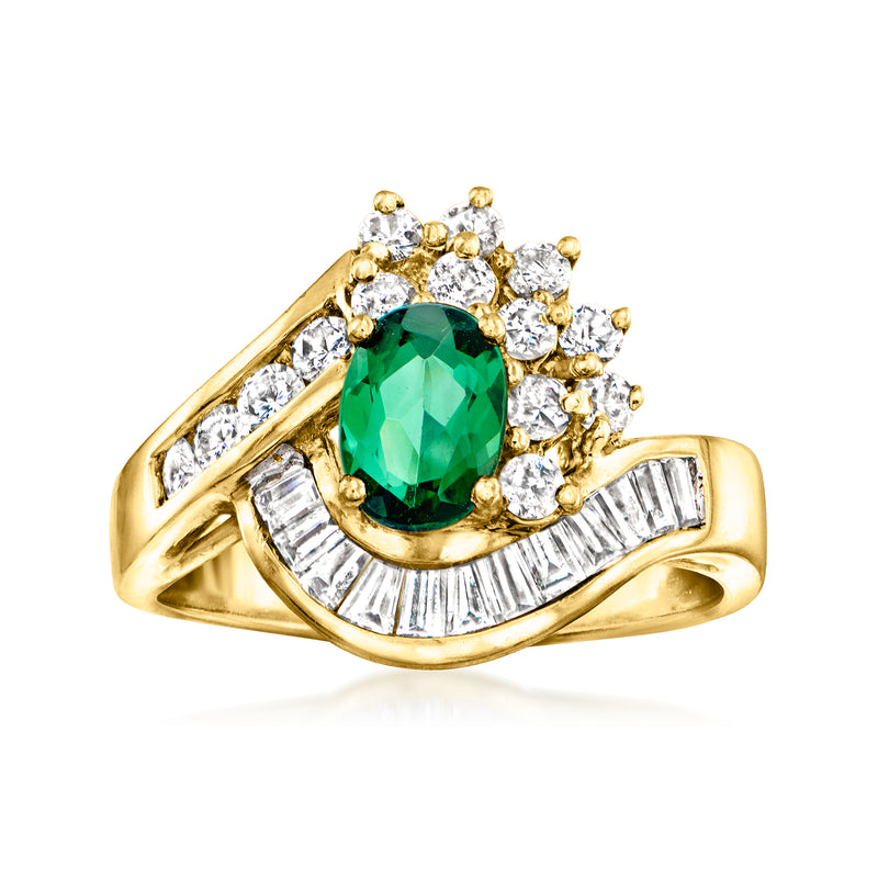 Yellow gold ring with oval green tourmaline and diamond halo