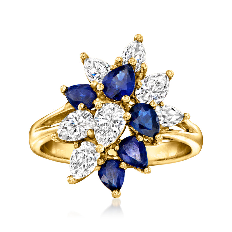 18kt yellow gold cluster ring with blue sapphires and diamond accents