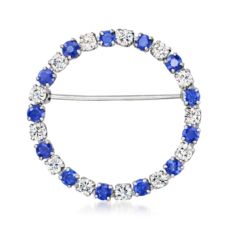 Vintage circular sapphire and diamond pin in white gold, with hinged bar clasp