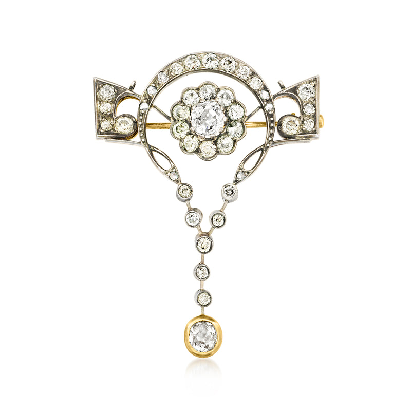 Vintage diamond floral pin with silver settings and yellow-gold round drop