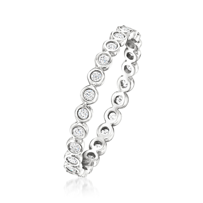 Bezel-set round diamond eternity band in 14kt white gold, side view