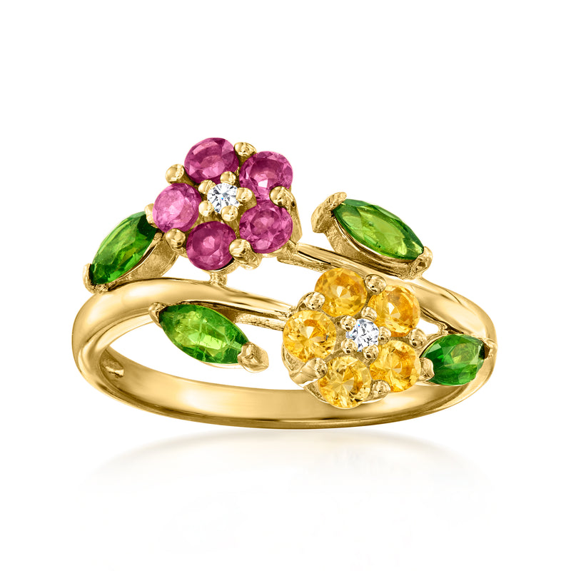 Gold-tone bypass ring with purple, green, and yellow gemstone flower clusters
