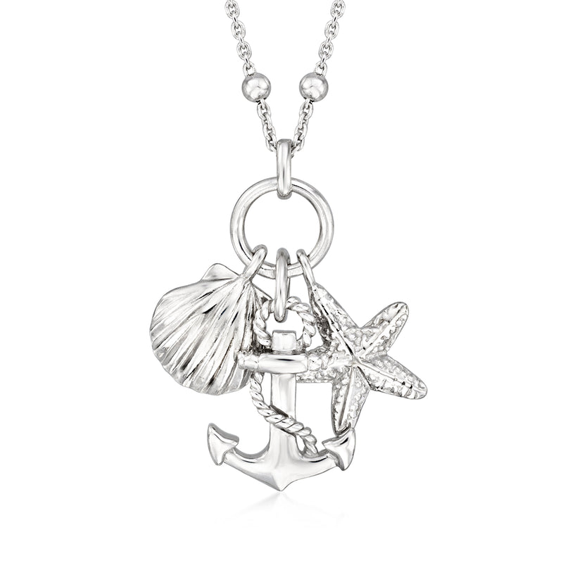 Sterling silver charm necklace with shell, anchor, and starfish pendant on chain