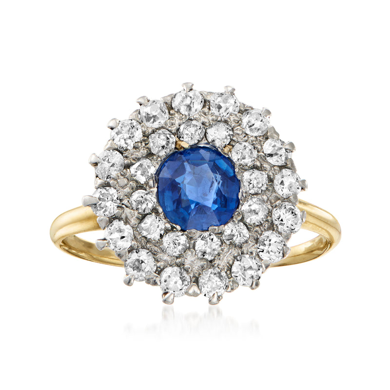 Vintage sapphire and diamond halo ring in yellow gold with platinum prongs