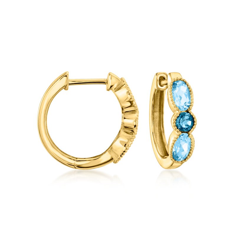 18kt gold over sterling huggie hoop earrings with oval blue topaz stones