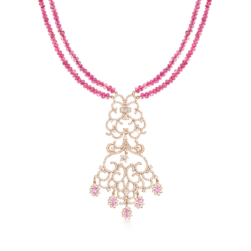 Two-tone gold necklace with pink gemstone beaded chain and ornate drop pendant
