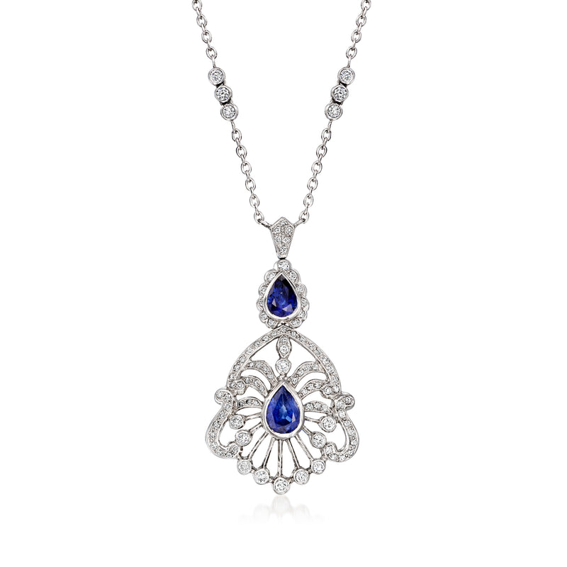 Vintage drop necklace with blue sapphire teardrop and diamond accents on white gold chain