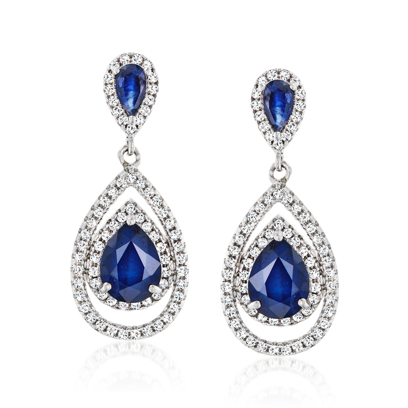 Sterling silver drop earrings with teardrop blue sapphire and white gemstone halos