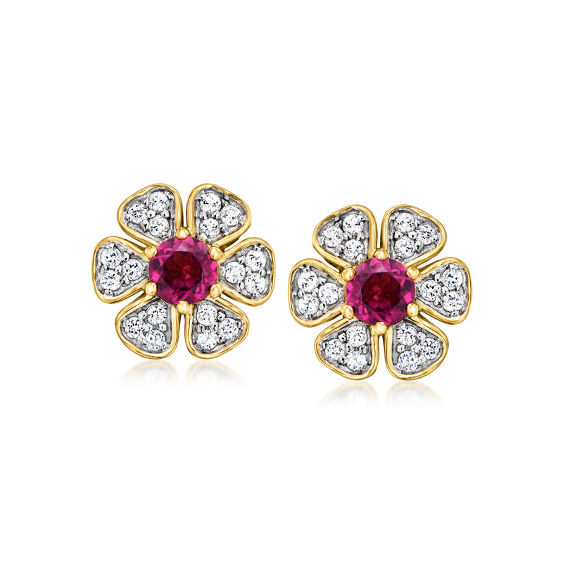 Gold flower stud earrings with red rhodolite center and white topaz petal stones