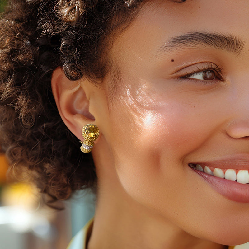 Citrine and diamond clip/post earrings in 18kt yellow gold, worn