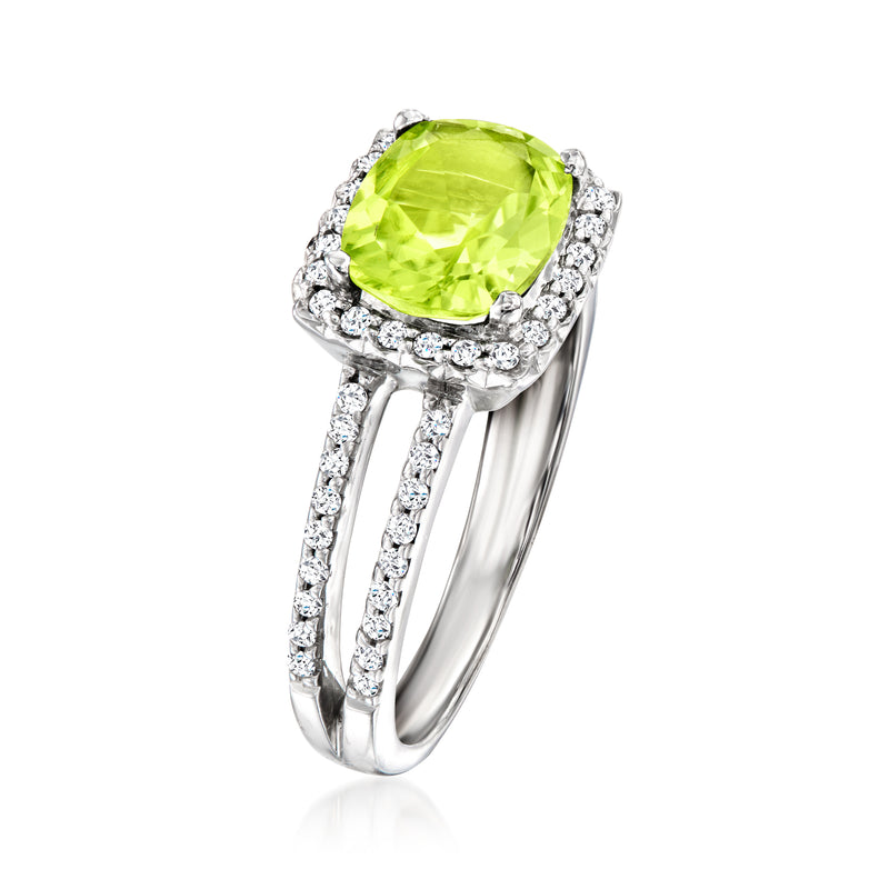 Vintage 14kt white gold ring with peridot center stone and diamond halo