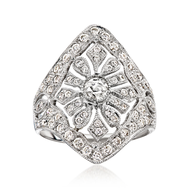 Vintage diamond cluster ring in white gold, square halo design with round stones