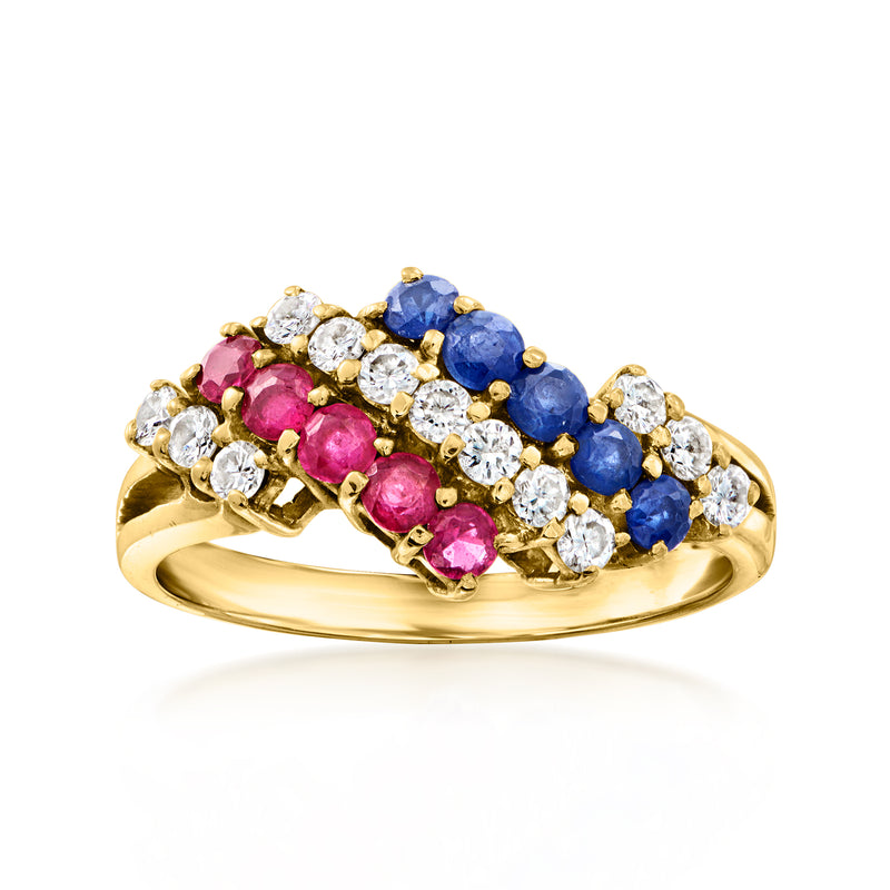 Vintage yellow gold gemstone ring with red ruby, blue sapphire, and clear diamond accents