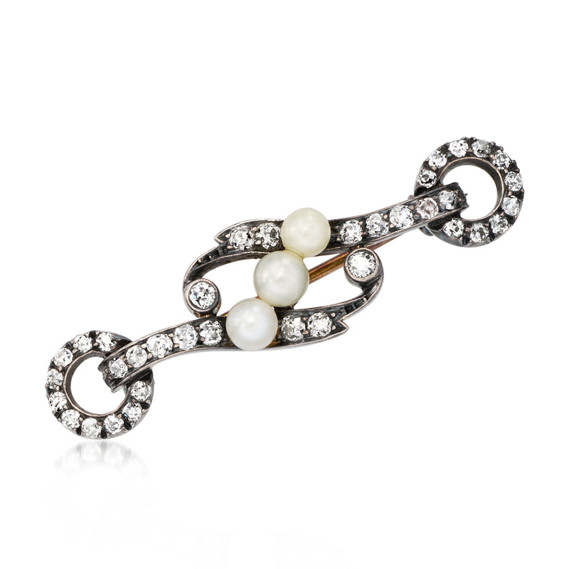 Vintage pearl and diamond pin with three white cultured pearls in silver settings
