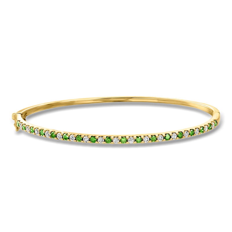 Yellow gold bangle bracelet with green and white diamond row setting