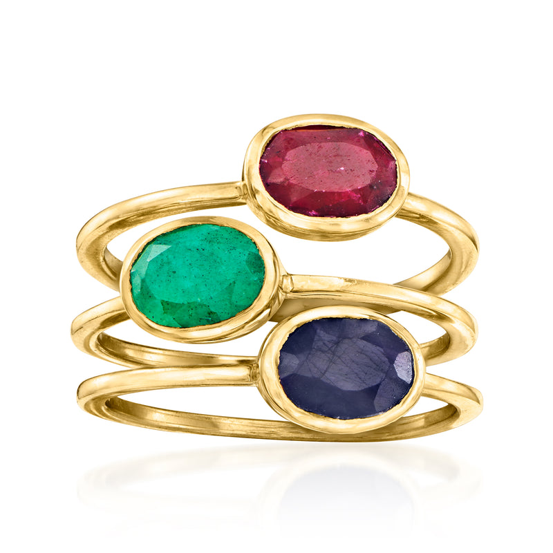 Three-ring gemstone set in gold-tone with oval red, green, and blue stones