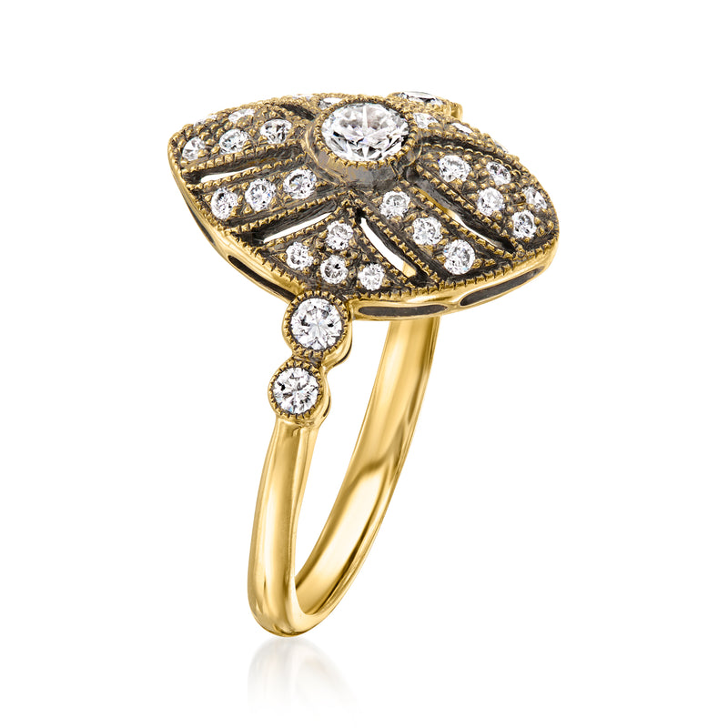 Vintage diamond ring in 18kt yellow gold with pavé oval top and round center stone