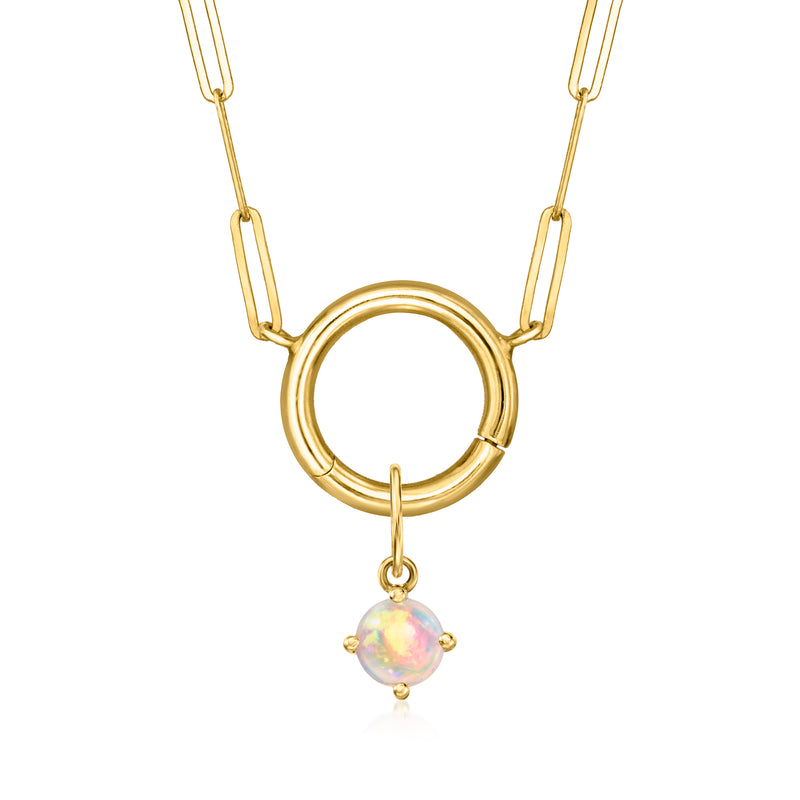14kt yellow gold birthstone charm pendant with small round opal-like pink gemstone