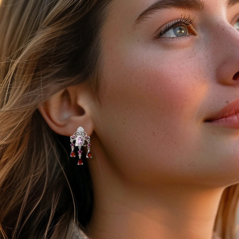 Sterling silver chandelier drop earrings with purple center and pink and red dangling stones