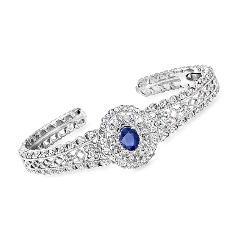 Sterling silver vintage cuff bracelet with oval blue sapphire center and clear gemstones