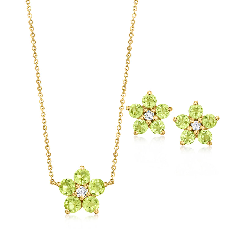 Gold over sterling flower jewelry set with green peridot-like stones and zircon accents