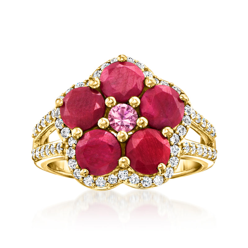 Gold flower ring with ruby-red and pink center stones and clear white sparkle accents