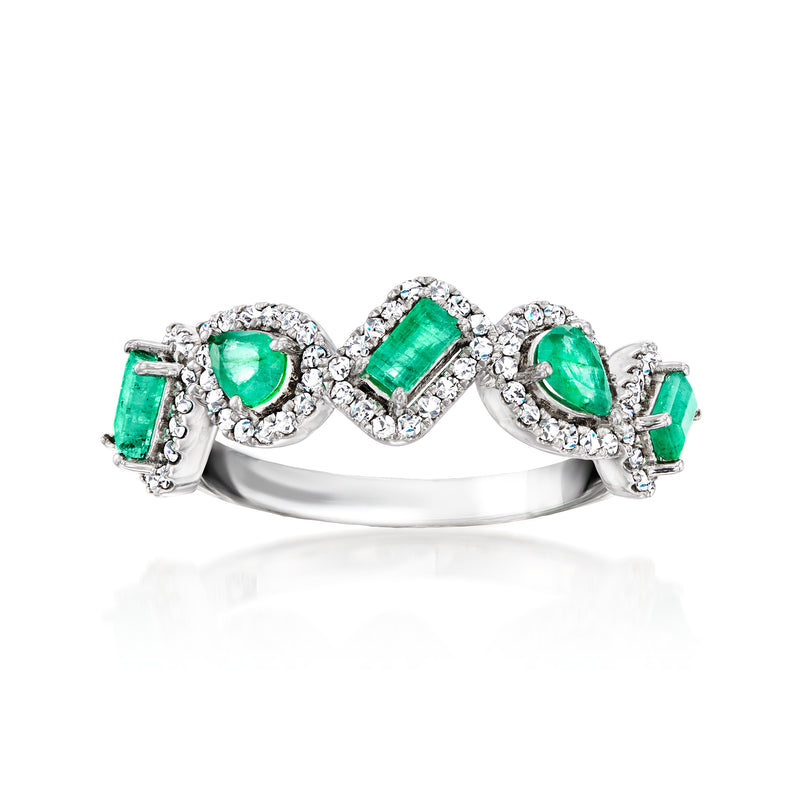 14kt white gold ring with green emerald center and side emeralds, surrounded by diamonds