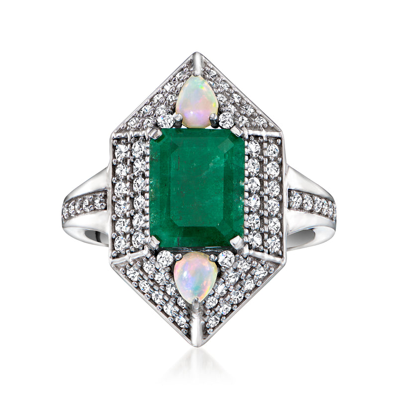 Sterling silver ring with green emerald-cut center stone and white zircon side stones