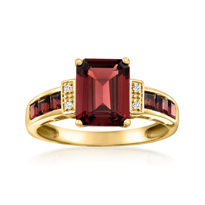 14kt yellow gold ring with square red garnet and diamond side accents