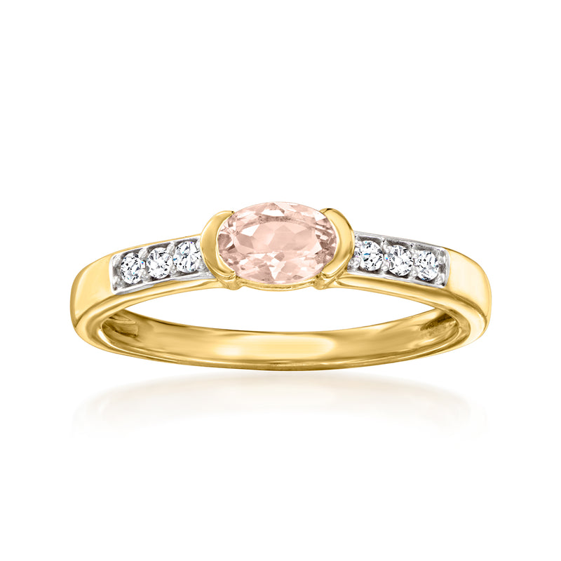 Gold oval morganite center ring with white zircon halo and split-shank accents.
