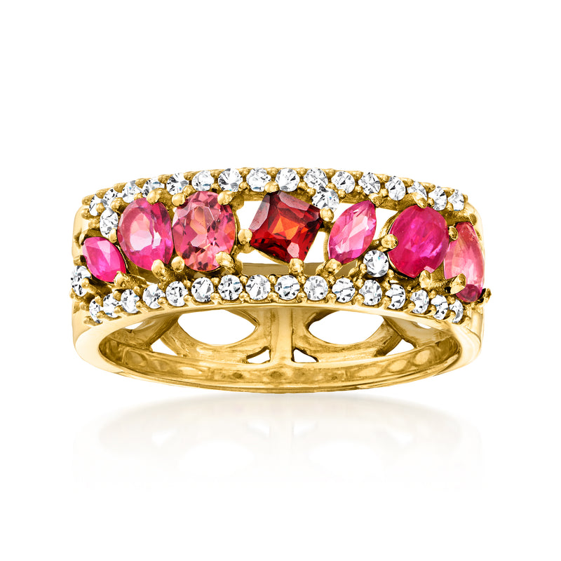 Gold ring with pink teardrop gemstones and round clear stones in a halo setting