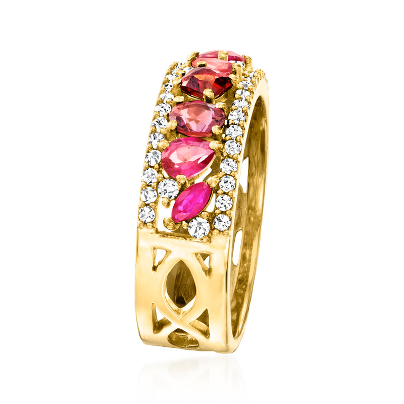 Gold side-view ring with pink gemstone row and small round clear stones along the band