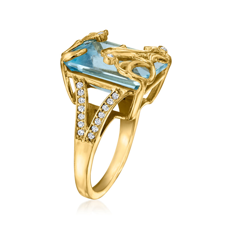 Gold-tone dolphin ring featuring sky-blue cushion gemstone and sparkling white zircon bands