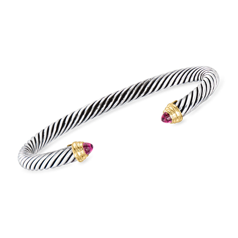 Vintage sterling silver cuff bracelet with yellow gold end caps and pink rhodolite garnets