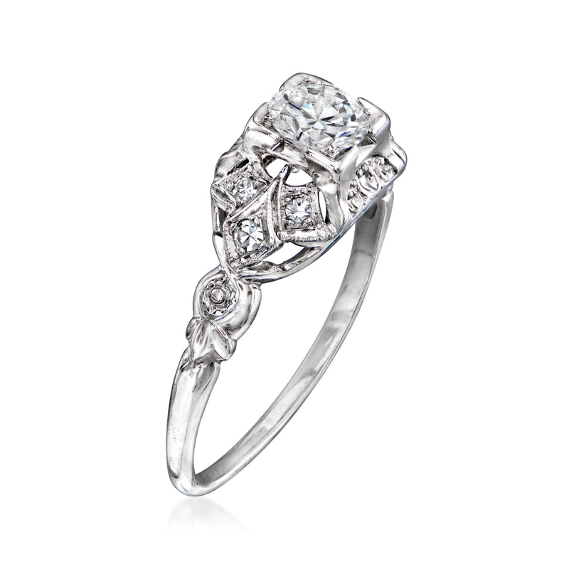 Vintage white gold diamond filigree ring, prong-set center stone, twisted side bands