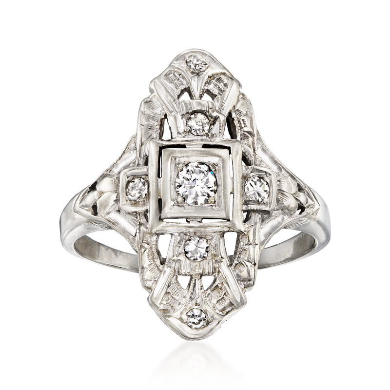 White gold diamond dinner ring with square center stone and filigree side diamonds