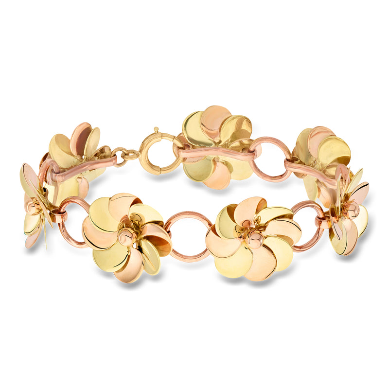 Two-tone gold flower-link bracelet with circular links, 7-inch vintage style